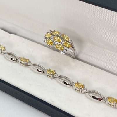 LOT 41: Sterling Silver Jewelry - Yellow Stone Necklace, Ring and Bracelet Set 18.5 GTW with Blue Stone Bezel Watch with 925 Accents on Band