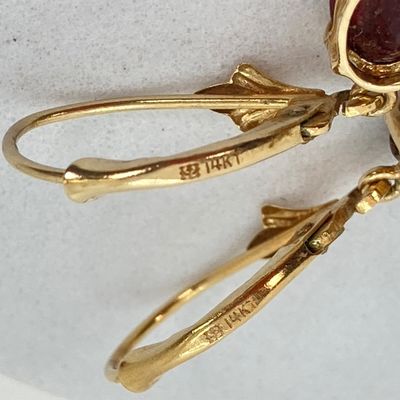 LOT 74: Gold and Garnet Lever Back Pierced Earrings - 14KT, 1.4 GTW