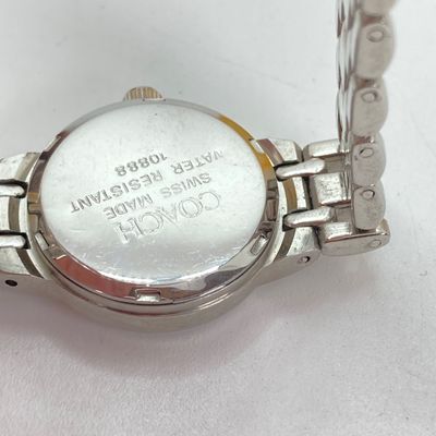 LOT 529: Large Collection of Silver Tone Jewelry - Earrings, Necklaces (Locket with Paper Scroll) and Fashion Watches