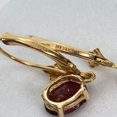LOT 74: Gold and Garnet Lever Back Pierced Earrings - 14KT, 1.4 GTW