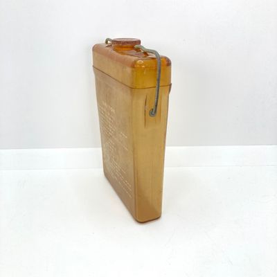 LOT 524: Vintage Military Collection - Survival Kit Plastic Rations Flask, Canteen, Pewter Eagle Figurine and More