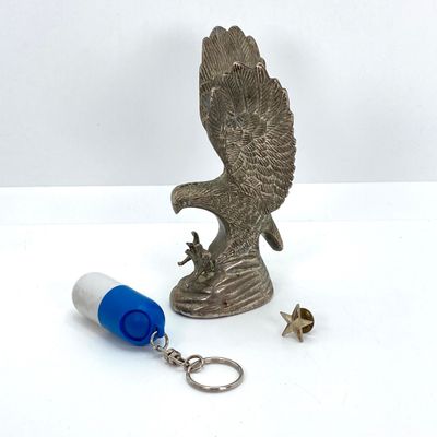 LOT 524: Vintage Military Collection - Survival Kit Plastic Rations Flask, Canteen, Pewter Eagle Figurine and More