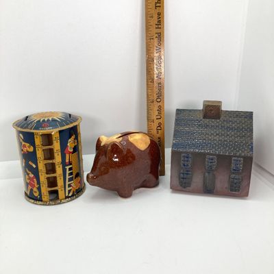 LOT 531: Vintage Coin Bank Collection - Tin Litho Rotary Sorter, Ceramic Cabin, Tin Litho Rotary Sorter, Rexair Vacuum and Piggy Bank