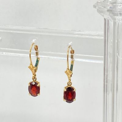 LOT 74: Gold and Garnet Lever Back Pierced Earrings - 14KT, 1.4 GTW