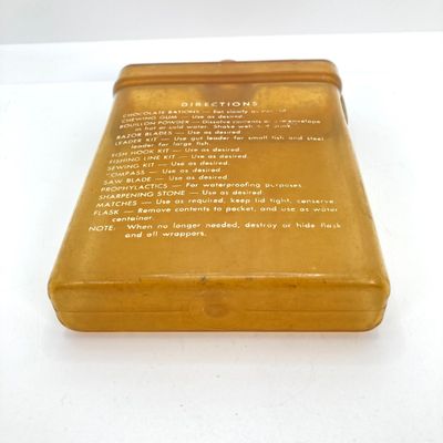 LOT 524: Vintage Military Collection - Survival Kit Plastic Rations Flask, Canteen, Pewter Eagle Figurine and More