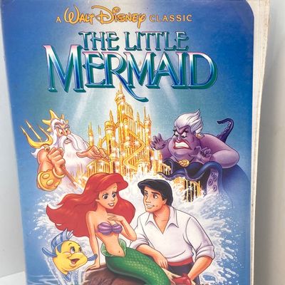 LOT 532: Classic Entertainment Collection - "Rick Grimes" Figurine in Original Box, VHS Disney's The Little Mermaid Movie,...