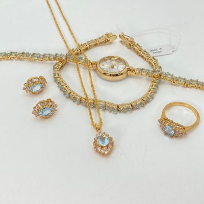 LOT 34: Gold Tone and Light Blue Stone Jewelry - Necklace 18" Chain, Ring, Watch, Earrings and Bracelet