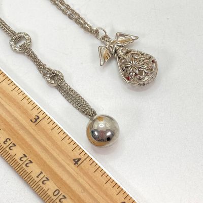 LOT 529: Large Collection of Silver Tone Jewelry - Earrings, Necklaces (Locket with Paper Scroll) and Fashion Watches