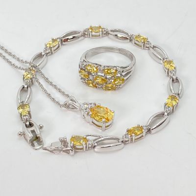 LOT 41: Sterling Silver Jewelry - Yellow Stone Necklace, Ring and Bracelet Set 18.5 GTW with Blue Stone Bezel Watch with 925 Accents on Band