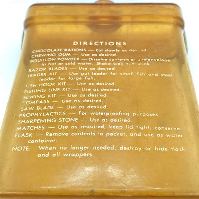 LOT 524: Vintage Military Collection - Survival Kit Plastic Rations Flask, Canteen, Pewter Eagle Figurine and More