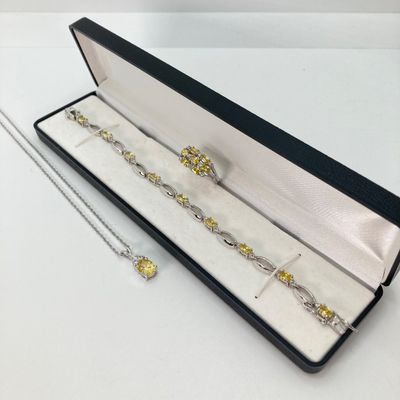 LOT 41: Sterling Silver Jewelry - Yellow Stone Necklace, Ring and Bracelet Set 18.5 GTW with Blue Stone Bezel Watch with 925 Accents on Band