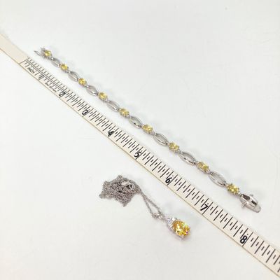 LOT 41: Sterling Silver Jewelry - Yellow Stone Necklace, Ring and Bracelet Set 18.5 GTW with Blue Stone Bezel Watch with 925 Accents on Band