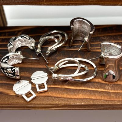 LOT 529: Large Collection of Silver Tone Jewelry - Earrings, Necklaces (Locket with Paper Scroll) and Fashion Watches