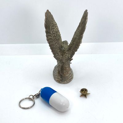 LOT 524: Vintage Military Collection - Survival Kit Plastic Rations Flask, Canteen, Pewter Eagle Figurine and More