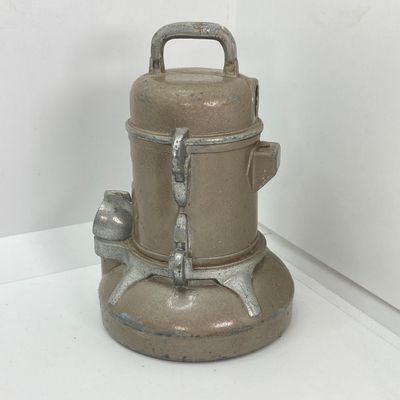 LOT 531: Vintage Coin Bank Collection - Tin Litho Rotary Sorter, Ceramic Cabin, Tin Litho Rotary Sorter, Rexair Vacuum and Piggy Bank