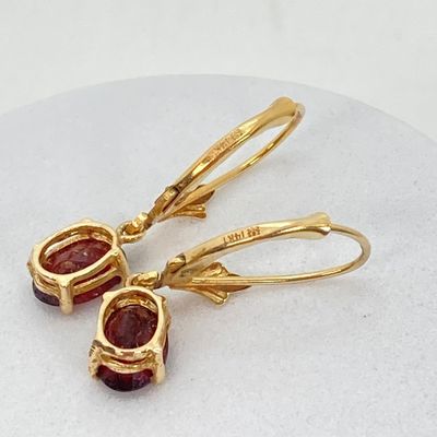 LOT 74: Gold and Garnet Lever Back Pierced Earrings - 14KT, 1.4 GTW