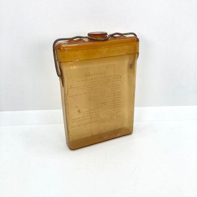 LOT 524: Vintage Military Collection - Survival Kit Plastic Rations Flask, Canteen, Pewter Eagle Figurine and More