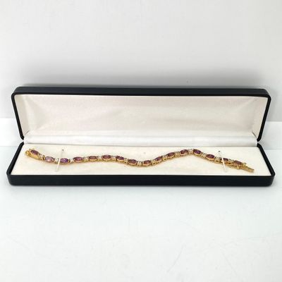 LOT 32: Gold Tone and Purple Stone Jewelry Set - Necklace 18", Ring, Bracelet and Two Pairs of Earrings