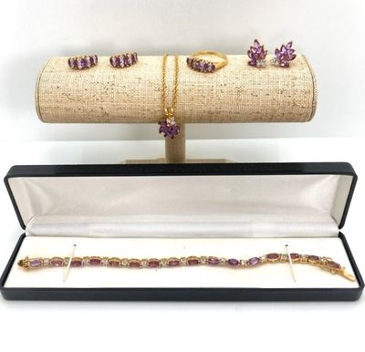 LOT 32: Gold Tone and Purple Stone Jewelry Set - Necklace 18", Ring, Bracelet and Two Pairs of Earrings