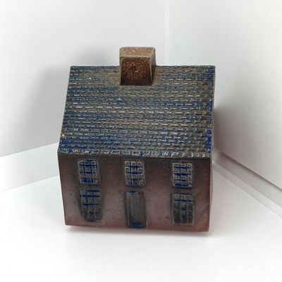 LOT 531: Vintage Coin Bank Collection - Tin Litho Rotary Sorter, Ceramic Cabin, Tin Litho Rotary Sorter, Rexair Vacuum and Piggy Bank