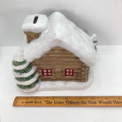 LOT 526: Vintage Collection - Large Made in Japan Knee Hugger / Elf, Post Cards and Sonoma Snowy Lodge / Cabin Coin Bank