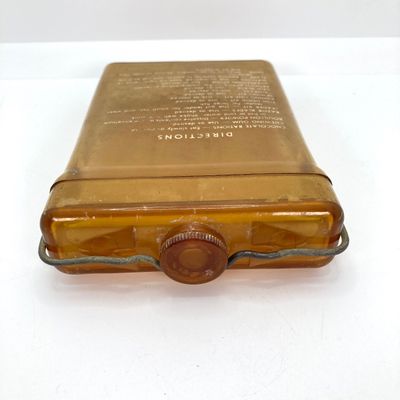 LOT 524: Vintage Military Collection - Survival Kit Plastic Rations Flask, Canteen, Pewter Eagle Figurine and More