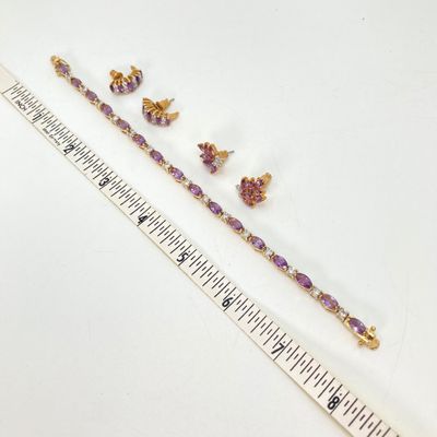 LOT 32: Gold Tone and Purple Stone Jewelry Set - Necklace 18", Ring, Bracelet and Two Pairs of Earrings