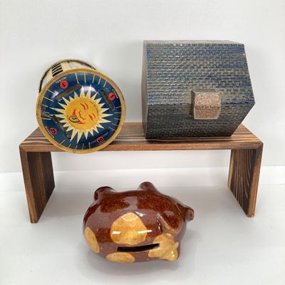LOT 531: Vintage Coin Bank Collection - Tin Litho Rotary Sorter, Ceramic Cabin, Tin Litho Rotary Sorter, Rexair Vacuum and Piggy Bank