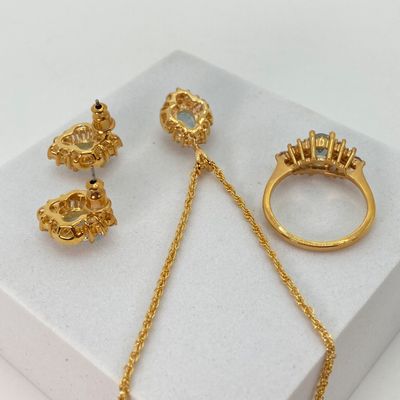 LOT 34: Gold Tone and Light Blue Stone Jewelry - Necklace 18" Chain, Ring, Watch, Earrings and Bracelet
