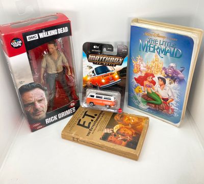 LOT 532: Classic Entertainment Collection - "Rick Grimes" Figurine in Original Box, VHS Disney's The Little Mermaid Movie,...