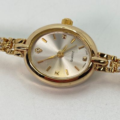 LOT 34: Gold Tone and Light Blue Stone Jewelry - Necklace 18" Chain, Ring, Watch, Earrings and Bracelet