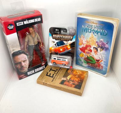 LOT 532: Classic Entertainment Collection - "Rick Grimes" Figurine in Original Box, VHS Disney's The Little Mermaid Movie,...