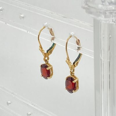 LOT 74: Gold and Garnet Lever Back Pierced Earrings - 14KT, 1.4 GTW