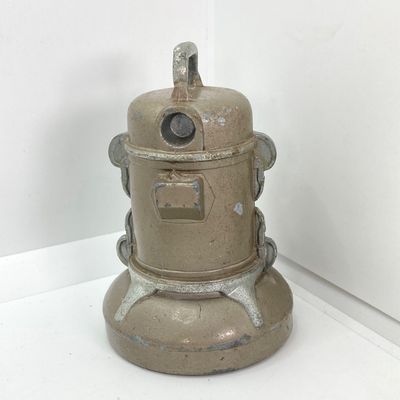LOT 531: Vintage Coin Bank Collection - Tin Litho Rotary Sorter, Ceramic Cabin, Tin Litho Rotary Sorter, Rexair Vacuum and Piggy Bank