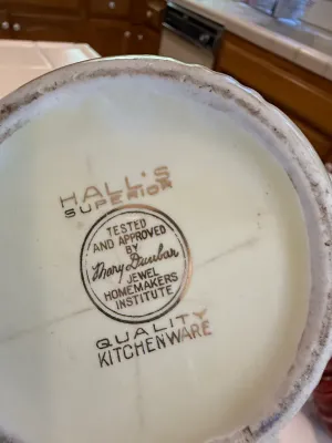 Sale Photo Thumbnail #464: Bottom maker's mark on a Hall's Superior Quality Kitchenware vessel, featuring the Mary Dunbar Jewel Homemakers Institute seal of approval.
