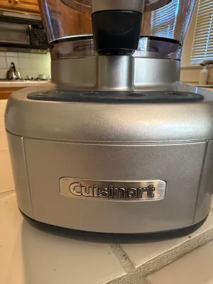 Sale Photo Thumbnail #435: Brushed stainless steel Cuisinart food processor base with plastic work bowl attached, in clean, working condition.