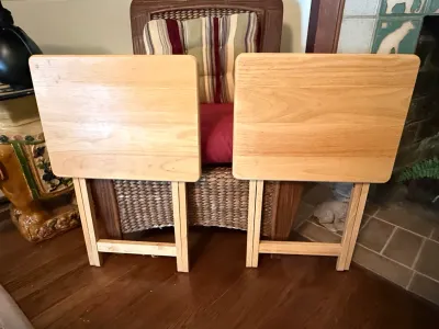 Sale Photo Thumbnail #234: Pair of light oak folding TV tray tables, showing light surface wear.