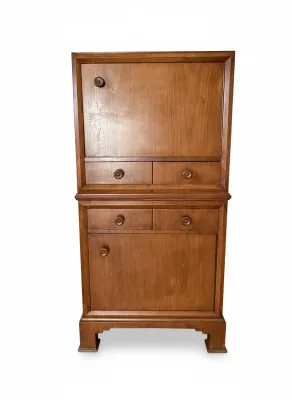 Sale Photo Thumbnail #307: Vintage solid wood two-piece secretary desk cabinet featuring a drop-front upper writing surface, small storage drawers, and lower cabinet storage.
