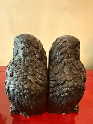 Sale Photo Thumbnail #153: Pair of vintage sculpted dark metal owl bookends featuring detailed feather textures.