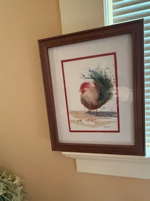 Sale Photo Thumbnail #220: Framed watercolor print of a rooster, double-matted in red and white with a dark wood frame.