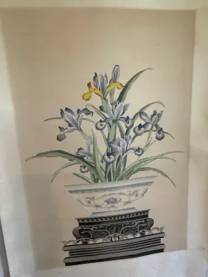 Sale Photo Thumbnail #373: Framed Asian-style silk embroidery art featuring blue and yellow irises in a porcelain bowl set upon an ornate black display stand.