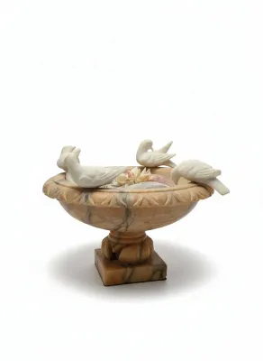 Sale Photo Thumbnail #20: Carved alabaster birdbath dish featuring removable carved white stone birds perched around the rim.