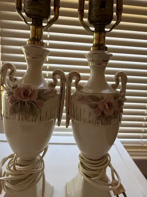 Sale Photo Thumbnail #368: Pair of vintage urn-style porcelain table lamps featuring applied pink rose accents and gold trim.