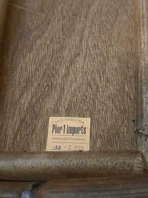 Sale Photo Thumbnail #192: Manufacturer's label on wooden furniture, indicating it was made in Indonesia exclusively for Pier 1 Imports and dated January 12, 2005.