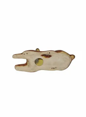Sale Photo Thumbnail #63: Underside view of a vintage glazed ceramic animal figurine showing unglazed base with a central fill hole.