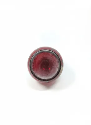 Sale Photo Thumbnail #55: Bottom view of a vintage ruby glass vessel with a silver overlay pattern.