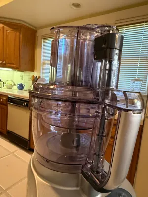 Sale Photo Thumbnail #436: Modern Cuisinart food processor with clear plastic work bowl and chute assembly.