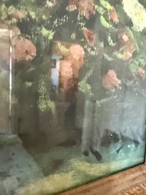 Sale Photo Thumbnail #313: Framed impressionistic artwork under glass depicting a floral motif in soft green, pink, and brown tones.