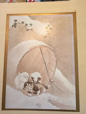 Sale Photo Thumbnail #303: Framed Japanese-style print depicting puppies under a snowy bamboo structure, presented with a gold metallic inner border and silk matting.