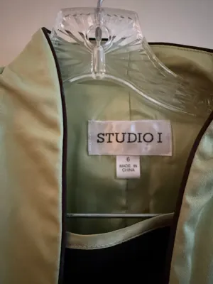 Sale Photo Thumbnail #271: Studio I pale green women's jacket with dark piping trim, size 6.